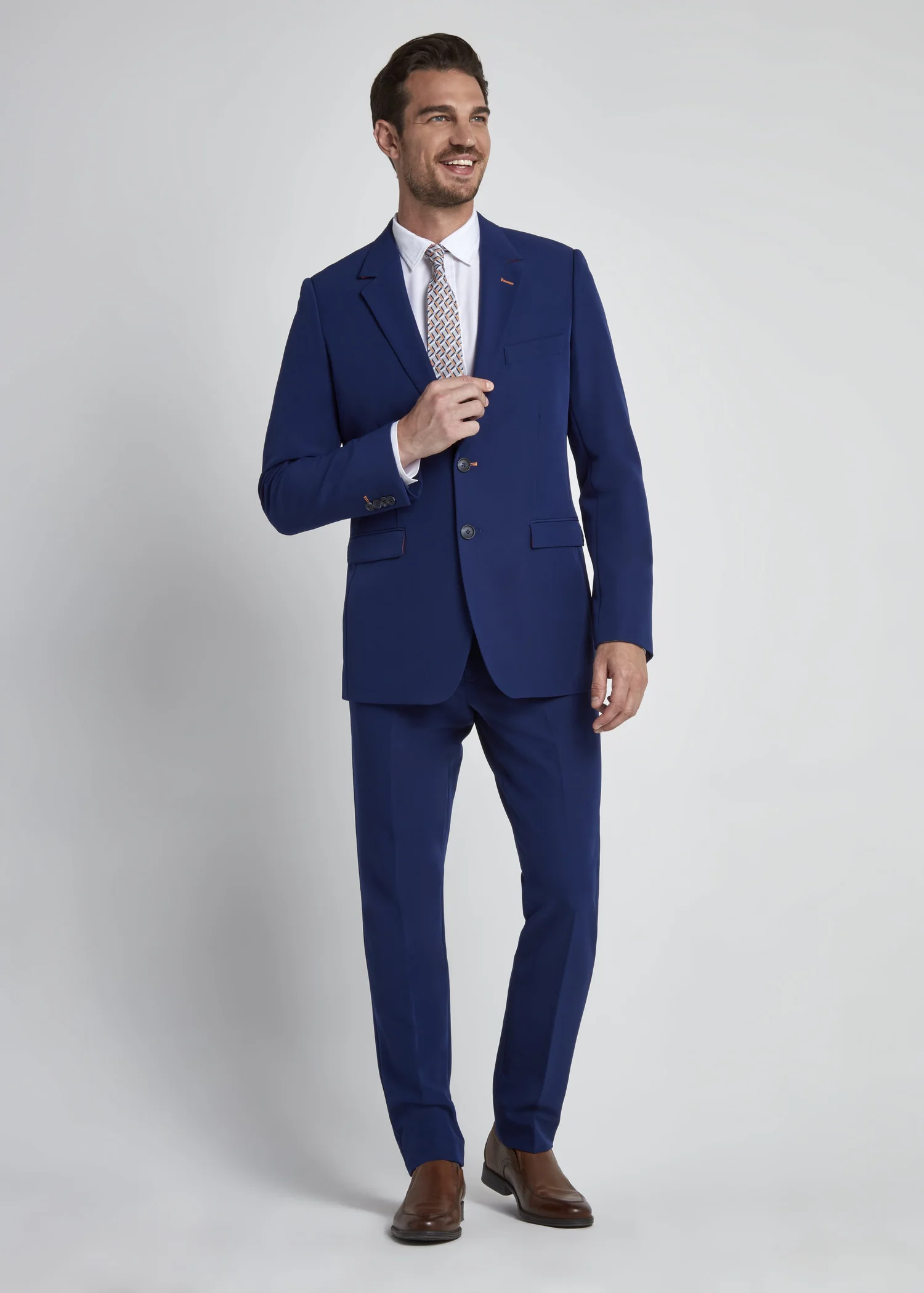 Navy tailored uniform suiting from the UNITEN Holland America Line collection